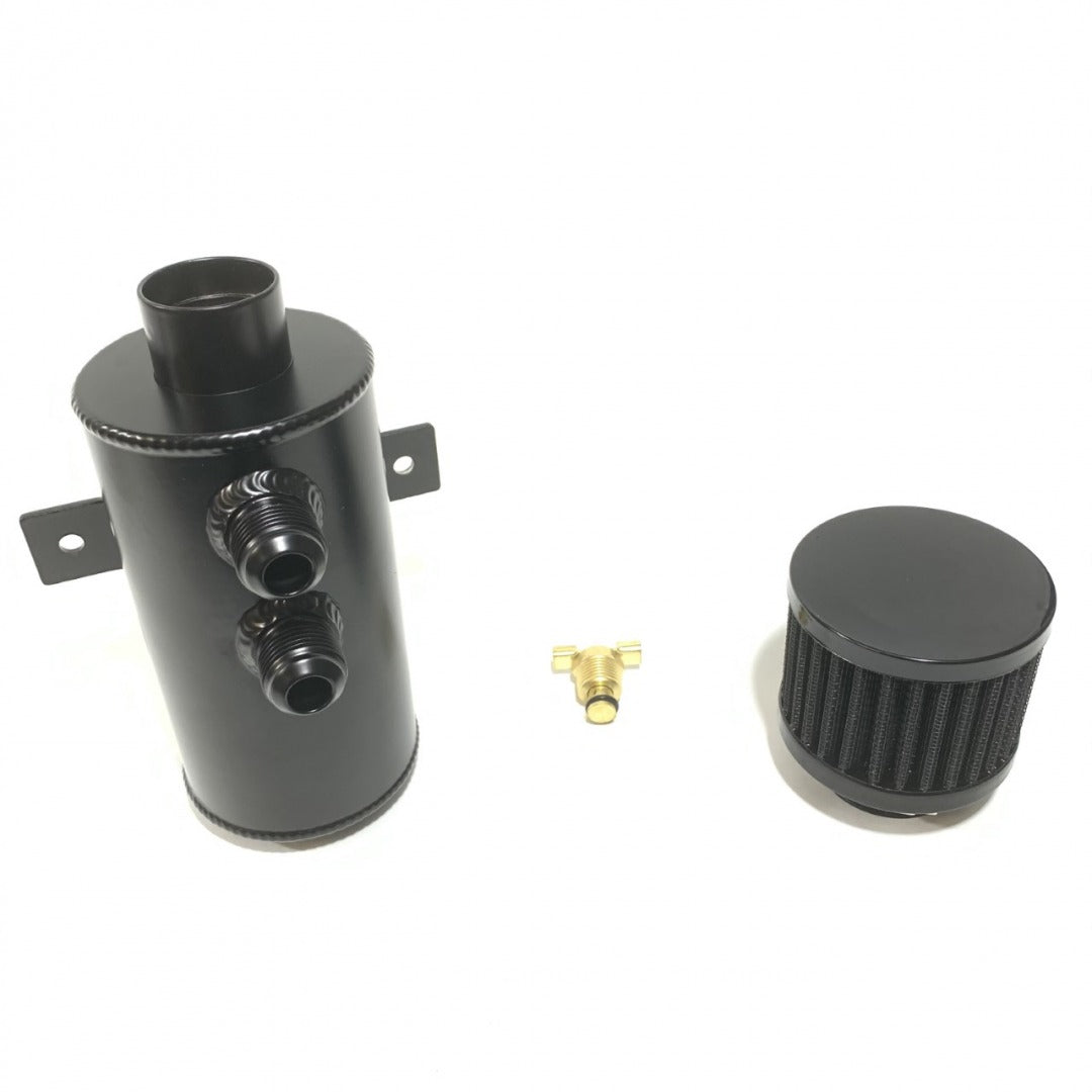 West Bend Dyno Universal Catch Can Kit installed in an engine bay, showing top-mounted breather filter and dual -10 AN ports.