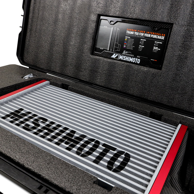 
                      
                        Mishimoto Universal Carbon Fiber Intercooler - Gloss Tanks - 525mm Silver Core - S-Flow - C V-Band
                      
                    