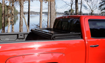 Lund 02-17 Dodge Ram 1500 Fleetside (6.4ft. Bed) Hard Fold Tonneau Cover - Black