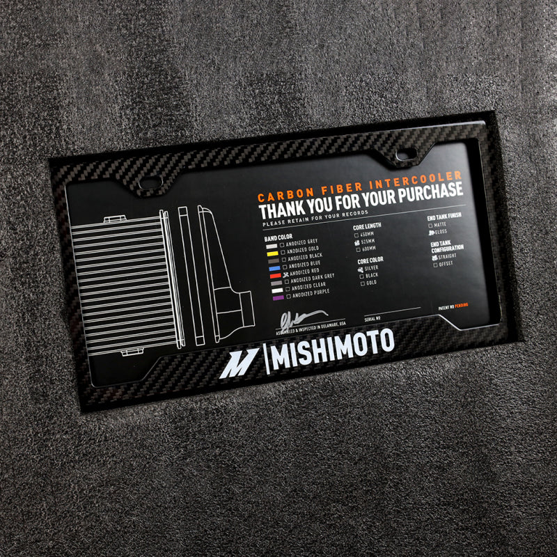 
                      
                        Mishimoto Universal Carbon Fiber Intercooler - Gloss Tanks - 525mm Silver Core - S-Flow - C V-Band
                      
                    