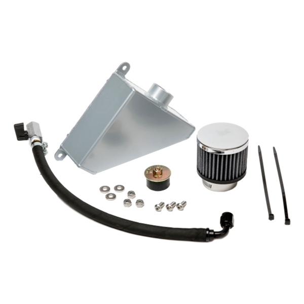 Universal West Bend Dyno Oil Catch Can installed in a 2010–2015 Camaro engine bay with top-mounted breather filter visible.